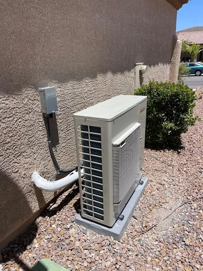 Residential air conditioning condenser unit in Tiffin